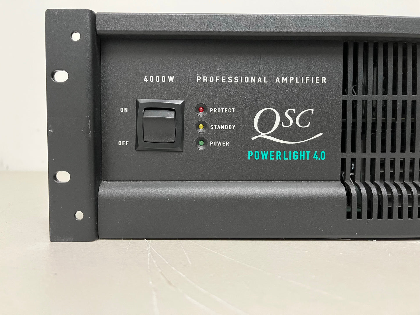 Used QSC PowerLight 4.0 Pro Audio Power Amplifier PL4.0 4000 Watts for Sale. We Sell Professional Audio Equipment. Audio Systems, Amplifiers, Consoles, Mixers, Electronics, Entertainment, Live Sound.