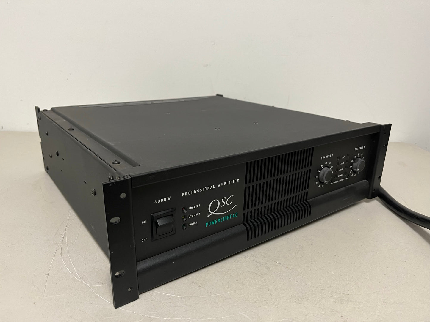 Used QSC PowerLight 4.0 Pro Audio Power Amplifier PL4.0 4000 Watts for Sale. We Sell Professional Audio Equipment. Audio Systems, Amplifiers, Consoles, Mixers, Electronics, Entertainment, Live Sound.