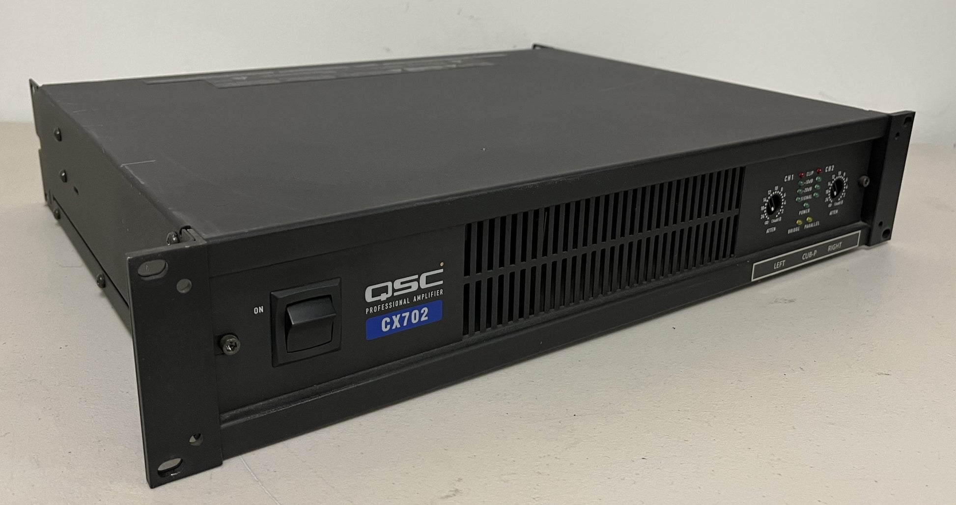Used QSC CX702 2-Channel Power Amplifier for Sale. We Sell Professional Audio Equipment. Audio Systems, Amplifiers, Consoles, Mixers, Electronics, Entertainment, Sound, Live.