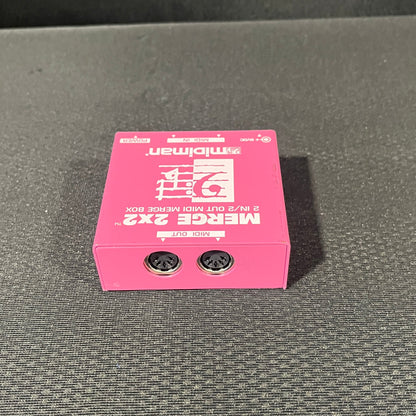 Midiman Merge 2x2 Midi Merge Box, Midiman Merge Box, Midi Merge Box, 2x2 Merge Box, Pink Midiman Merge Box. We Sell Professional Audio Equipment. Audio Systems, Amplifiers, Consoles, Mixers, Electronics, Entertainment, Live Sound.