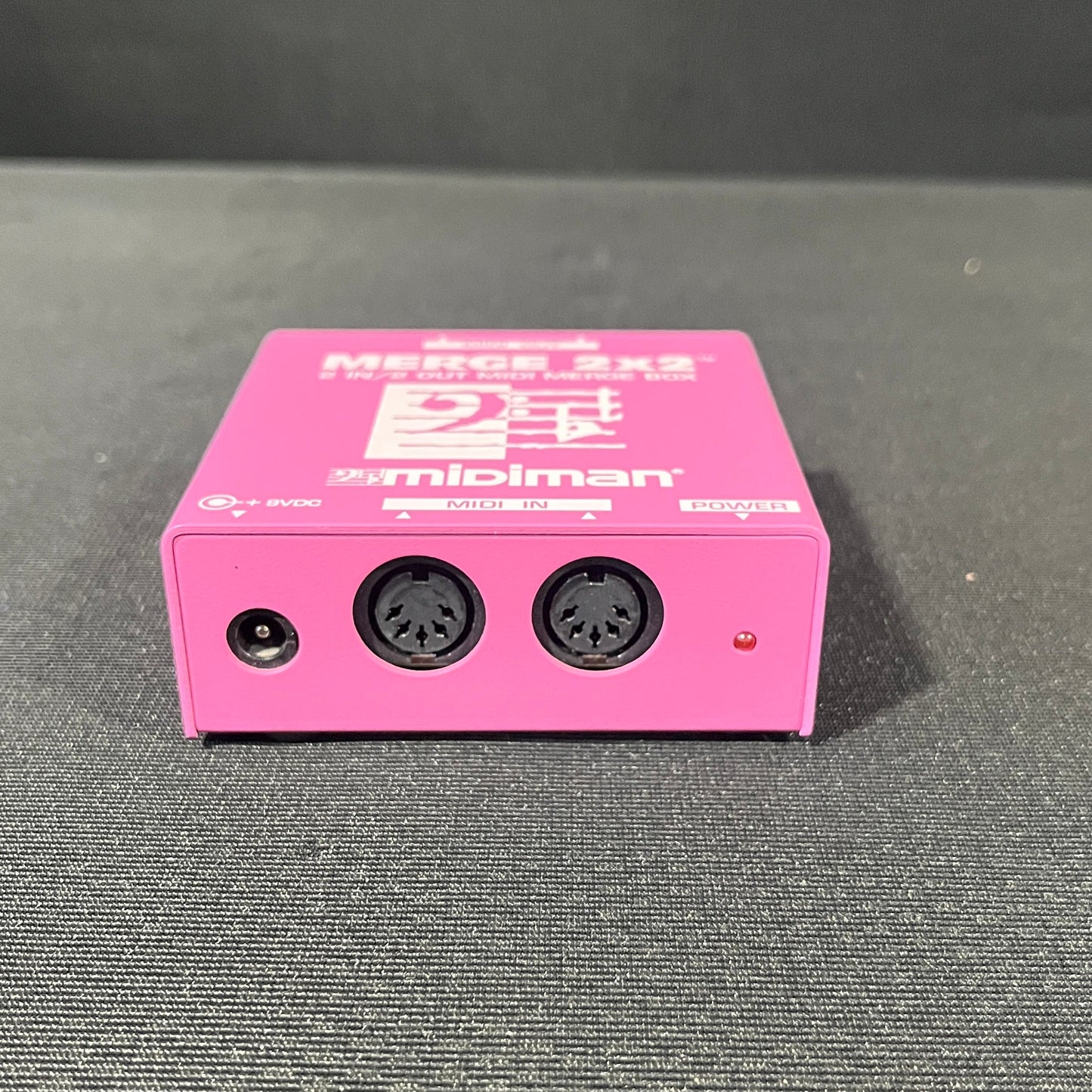 Midiman Merge 2x2 Midi Merge Box, Midiman Merge Box, Midi Merge Box, 2x2 Merge Box, Pink Midiman Merge Box. We Sell Professional Audio Equipment. Audio Systems, Amplifiers, Consoles, Mixers, Electronics, Entertainment, Live Sound.