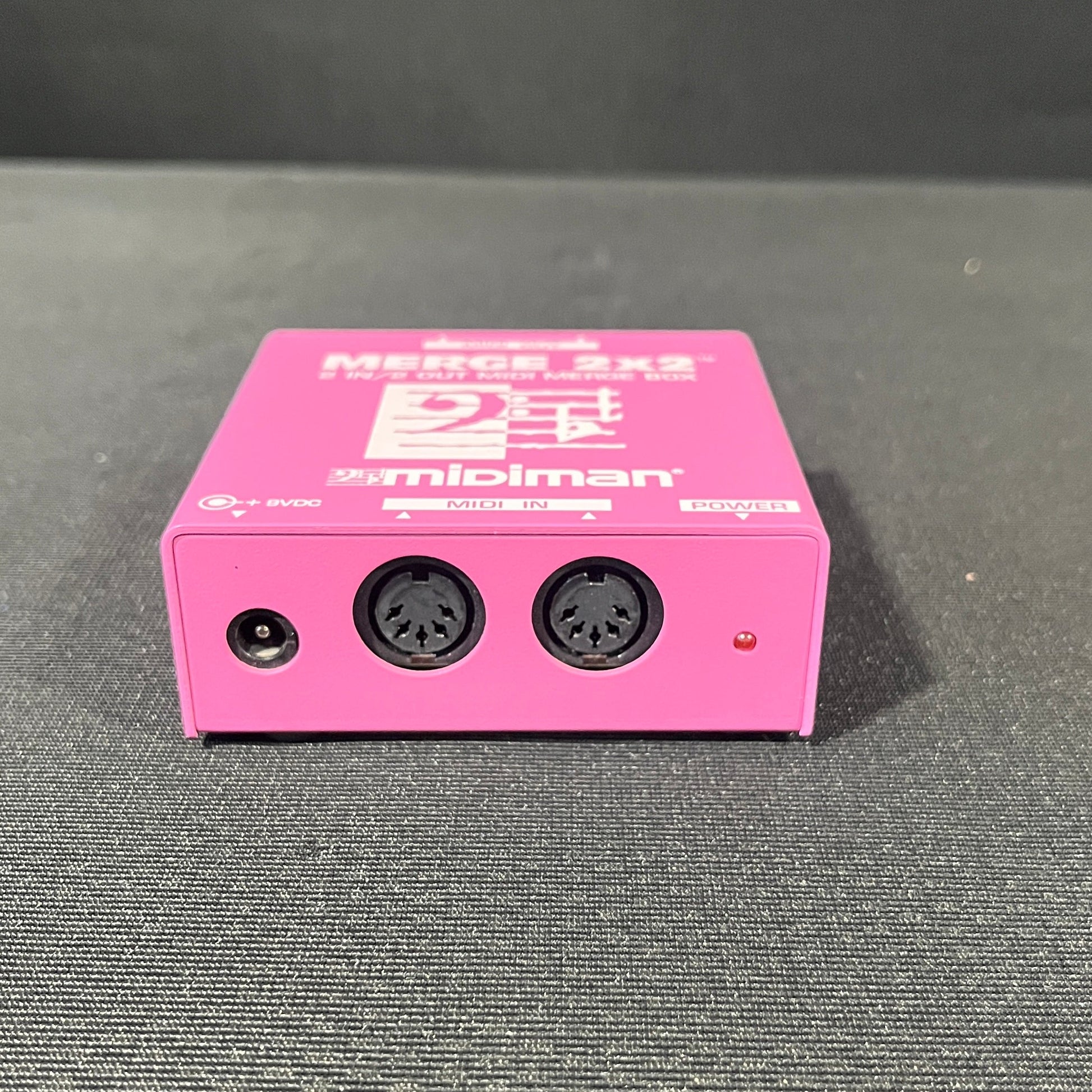 Midiman Merge 2x2 Midi Merge Box, Midiman Merge Box, Midi Merge Box, 2x2 Merge Box, Pink Midiman Merge Box. We Sell Professional Audio Equipment. Audio Systems, Amplifiers, Consoles, Mixers, Electronics, Entertainment, Live Sound.